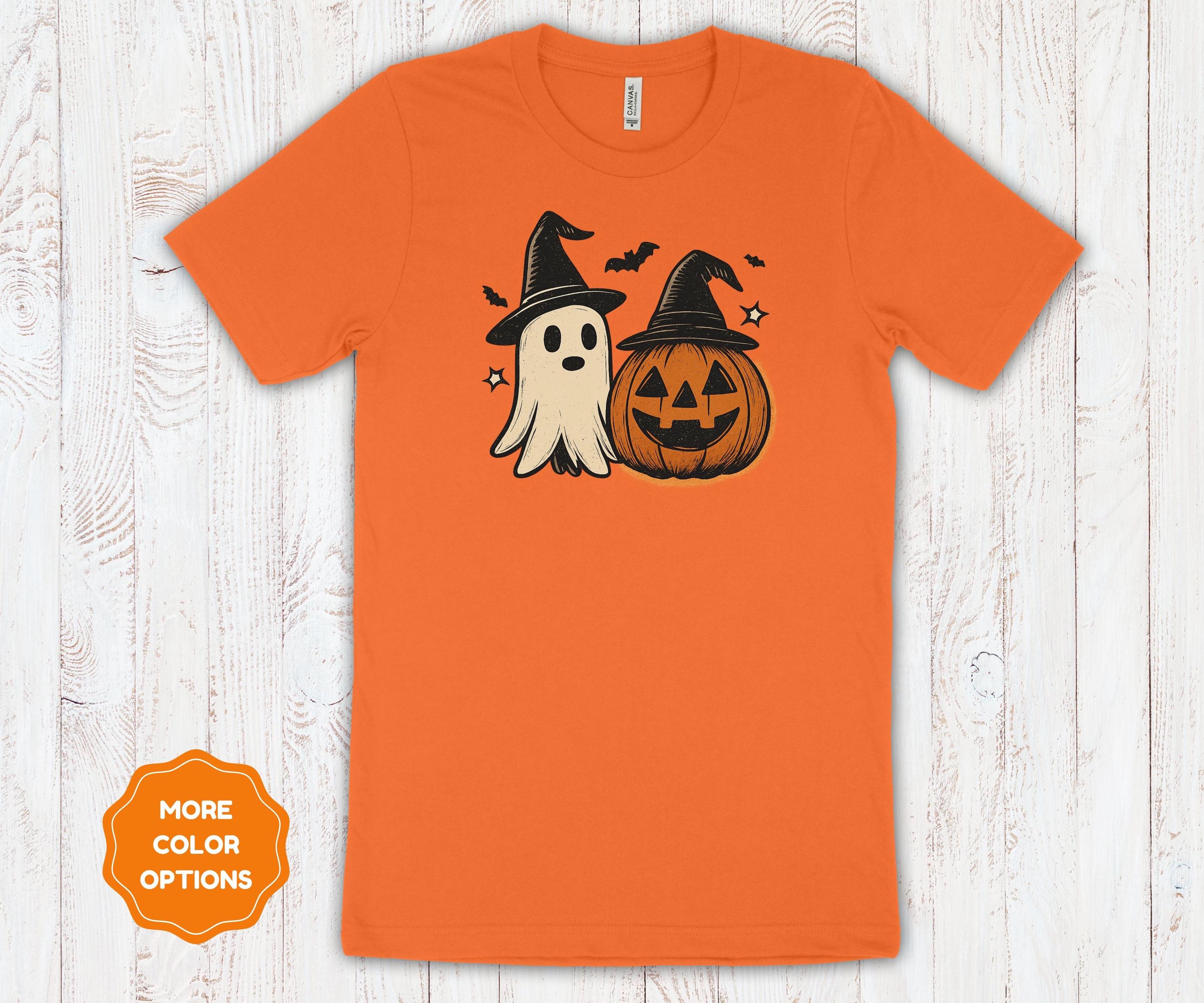 Ghost And Pumpkin Halloween T-Shirt   Vintage Distressed Witch Hat Graphic Tee   Spooky Fall Shirt for Halloween Party
